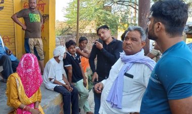 चलती बाइक से कूदी महिला घायल