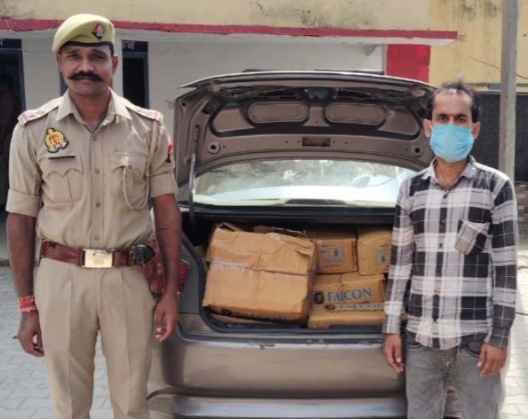 शराब से लदी लग्जरी कार सहित तस्कर गिरफ्तार